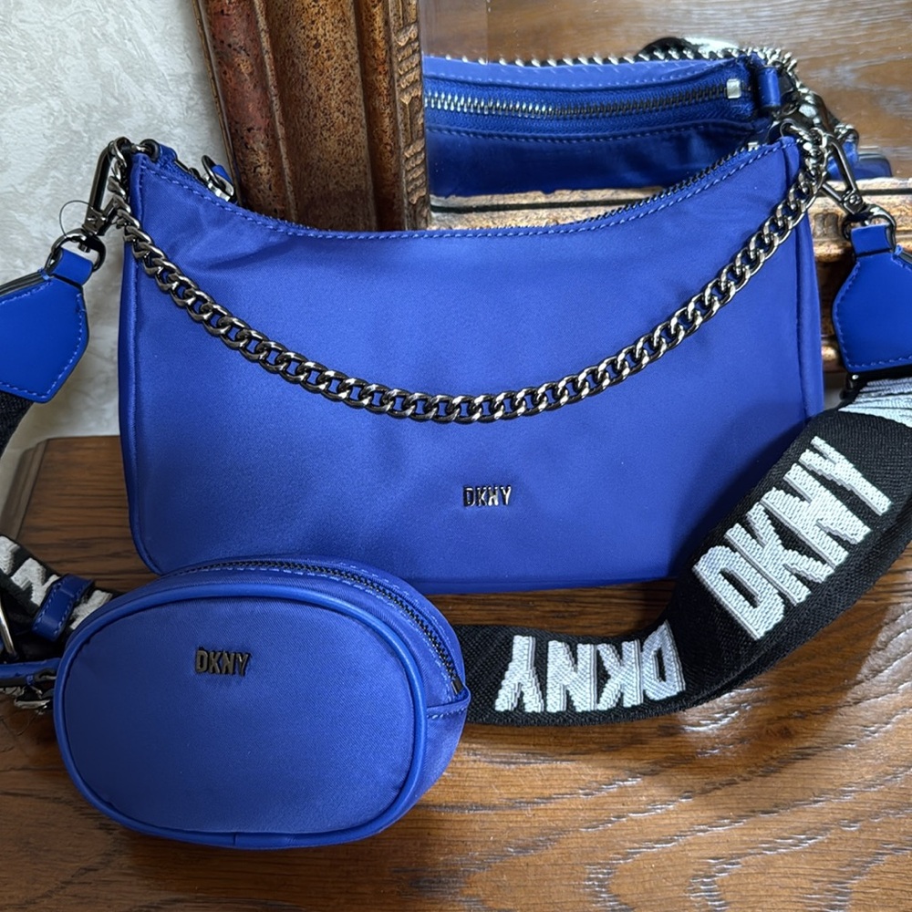New DKNY crossbody or chain handle purse. Blue.  Adjustable 1.5”wide DKNY strap.